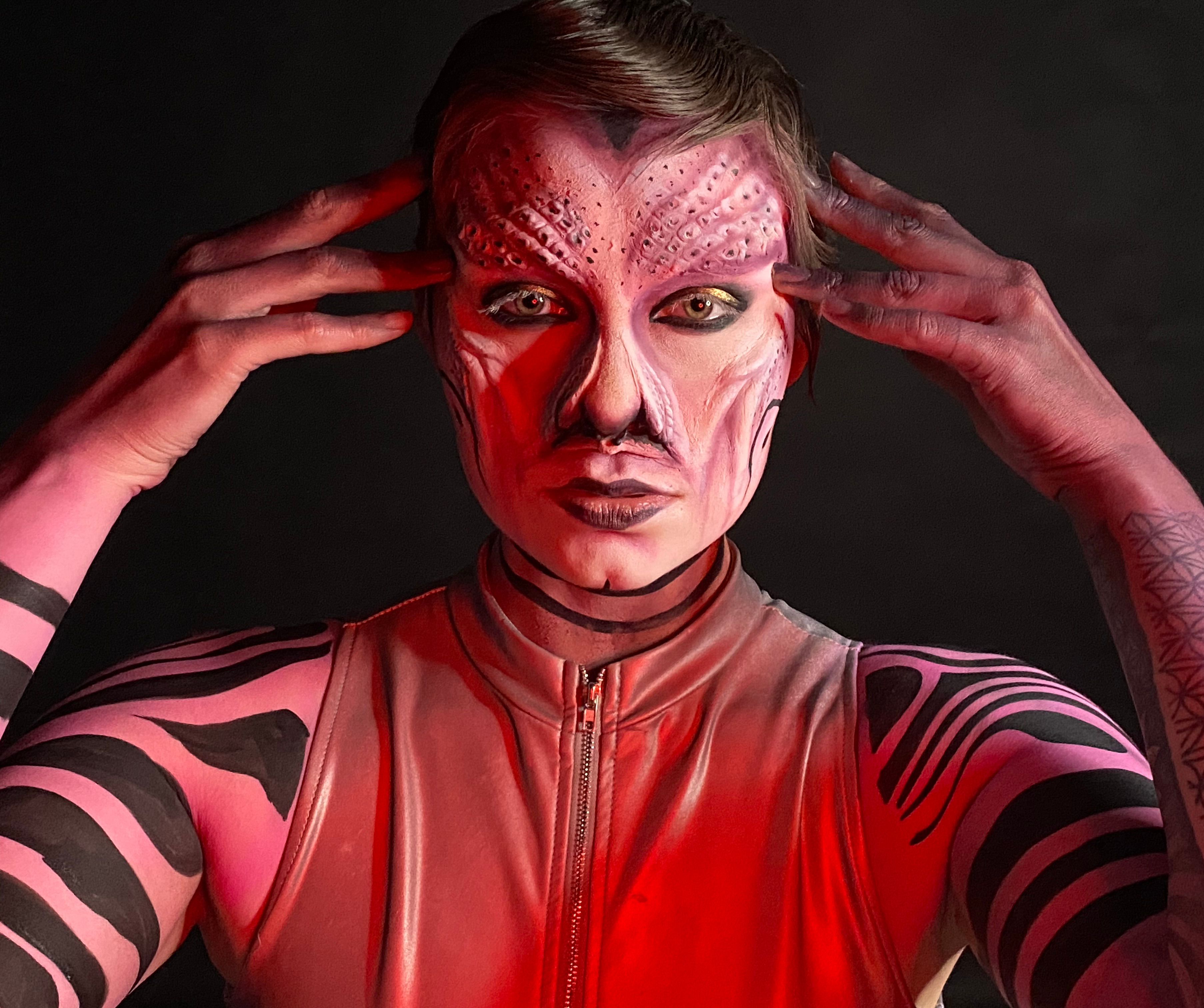 Special FX vs prosthetic makeup of man who looks like a red tiger